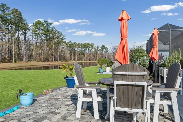 Patio and firepit seating in the backyard at 1217 St. Somewhere Drive