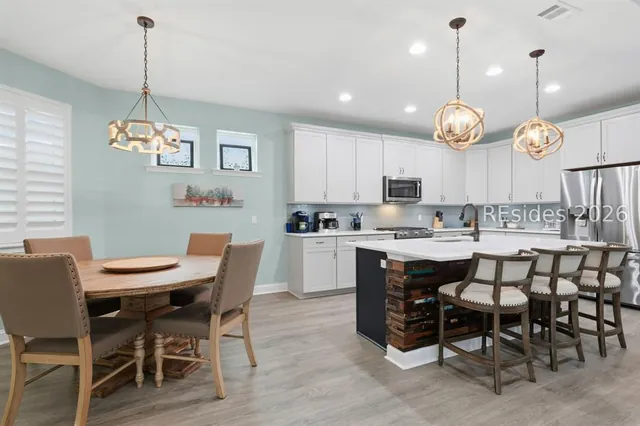 Kitchen with island seating at 1217 St. Somewhere Drive