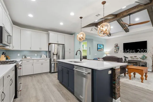Kitchen with stainless appliances at 1217 St. Somewhere Drive