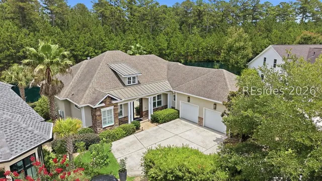 Aerial view of 165 Topside E on the water in Latitude Lakes, Hardeeville SC