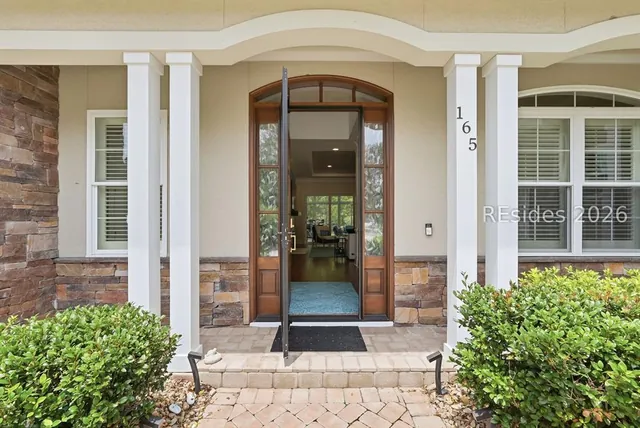 Covered front entry with columns at 165 Topside E