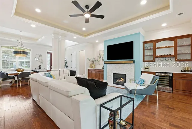 Living area with fireplace and built-ins at 165 Topside E