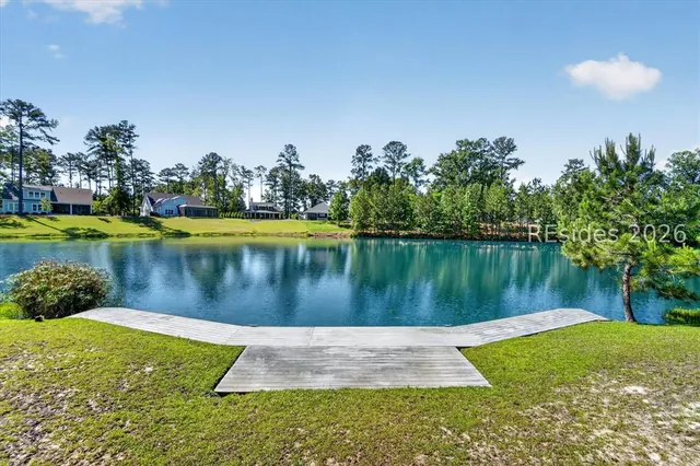 Private dock and lake frontage at 174 Slack Tide Drive