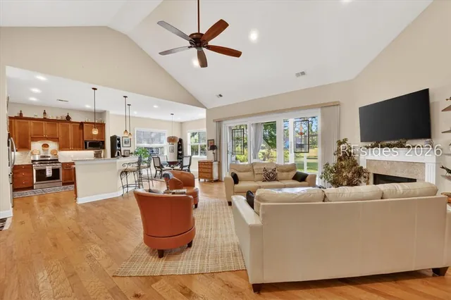 Open living area with vaulted ceiling at 174 Slack Tide Drive