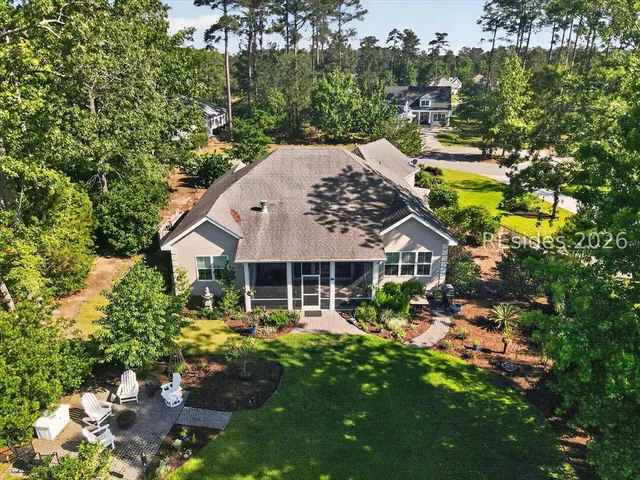 Aerial of the home and its wooded lot at 174 Slack Tide Drive