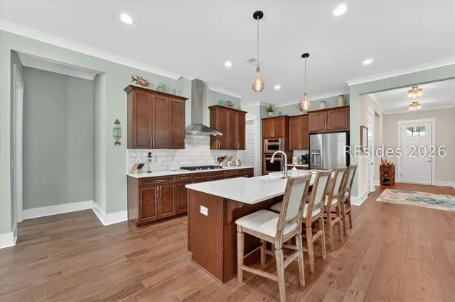 Kitchen with island seating at 246 Laurel Oak Avenue