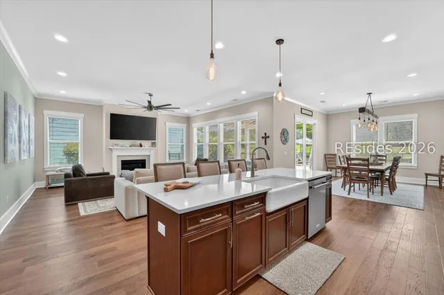 Kitchen open to the living area at 246 Laurel Oak Avenue
