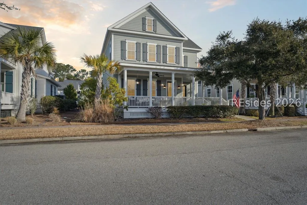 5 Caspian Lane at dusk — Lowcountry exterior with full front porch in Oldfield, Bluffton SC