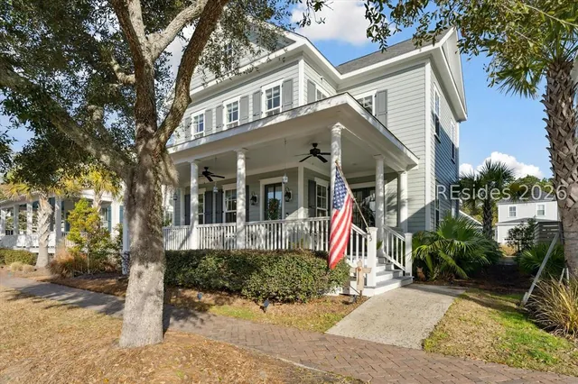 Front elevation of 5 Caspian Lane framed by a live oak, Oldfield, Bluffton SC